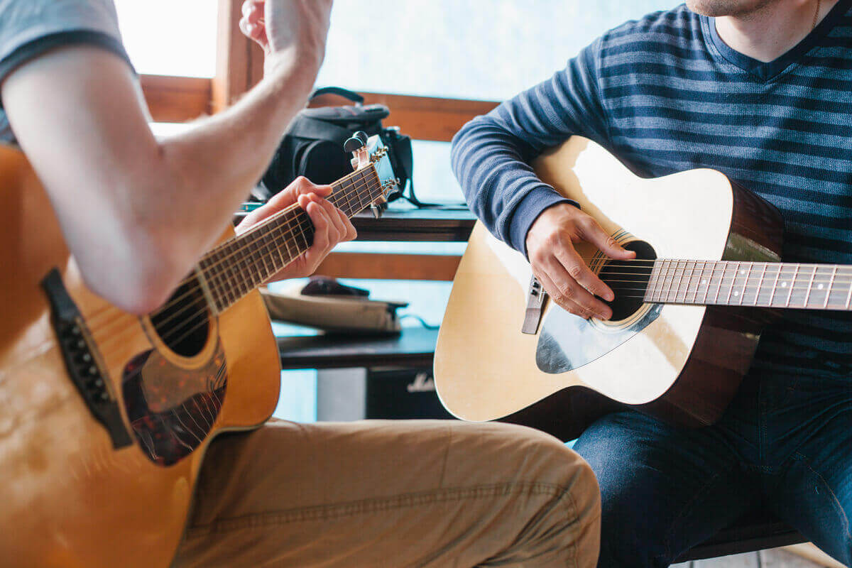 Student taking a private guitar lesson
